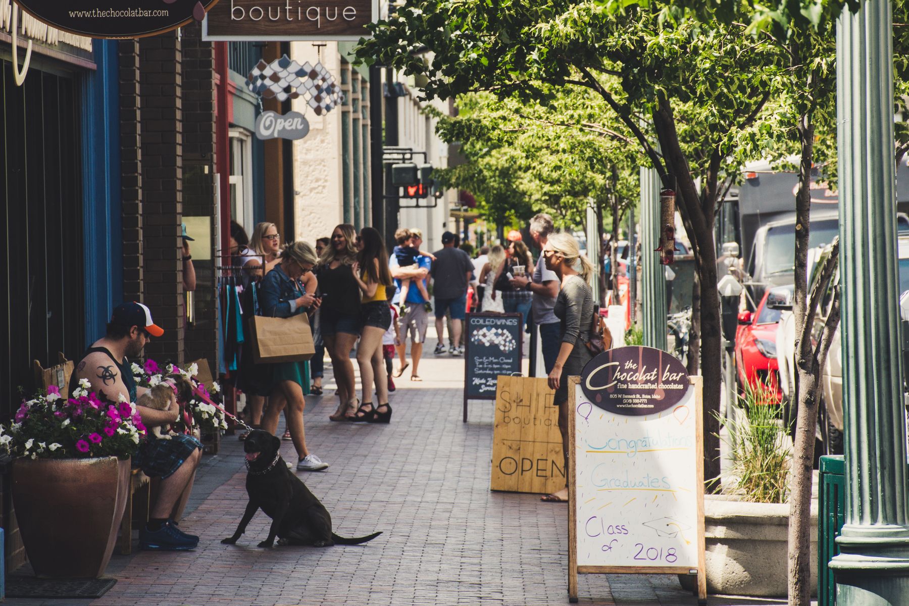Shoppers and cafes along a small-town main street