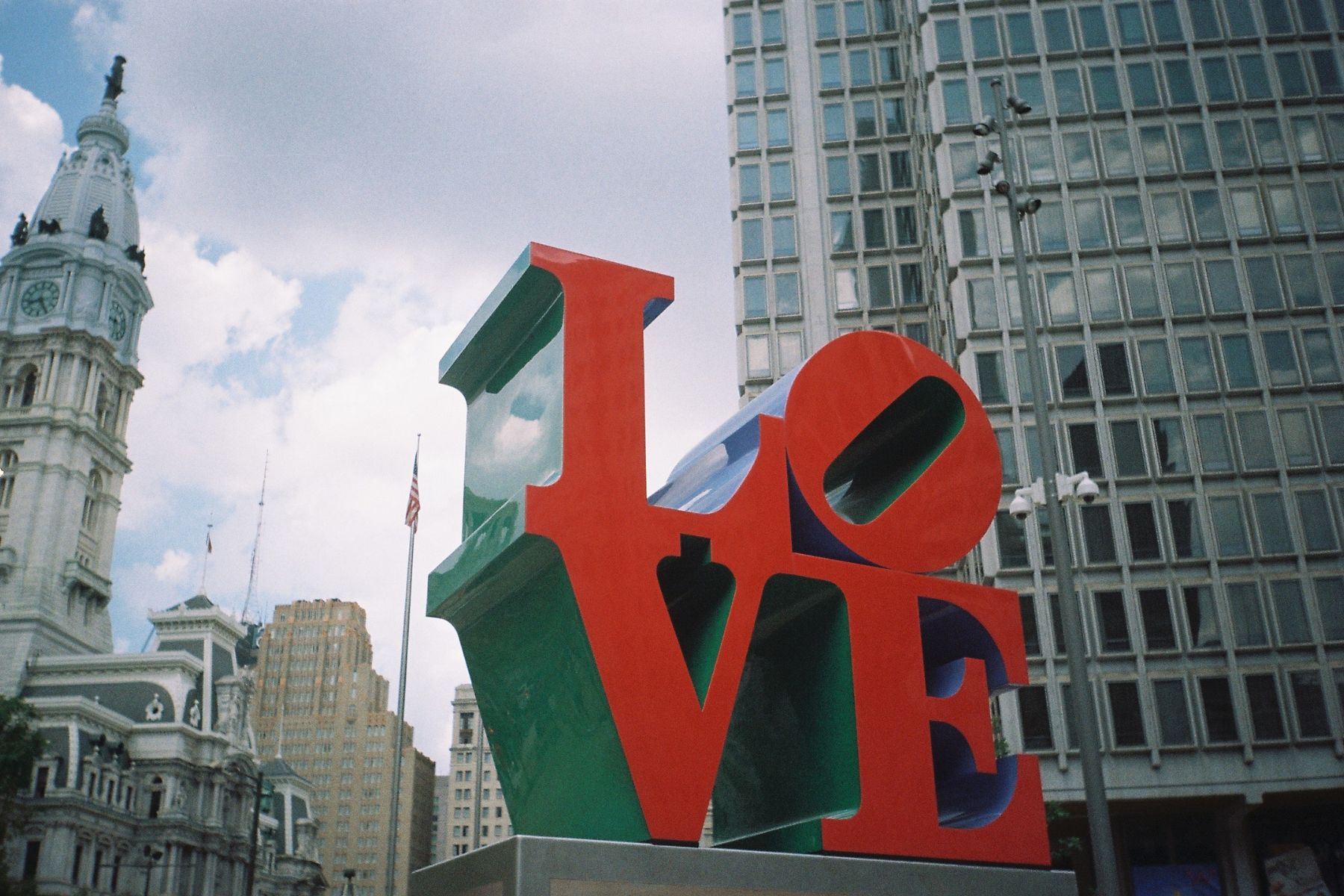 LOVE sculpture in Philadelphia with City Hall in the background