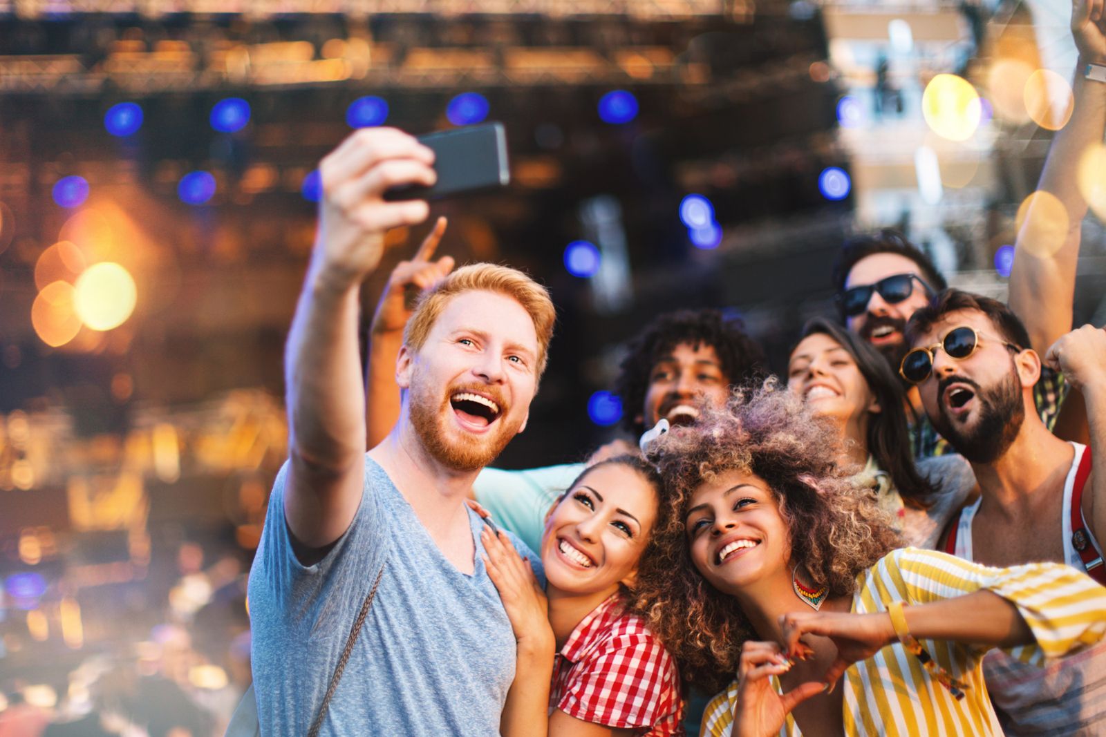Friends enjoying a live concert